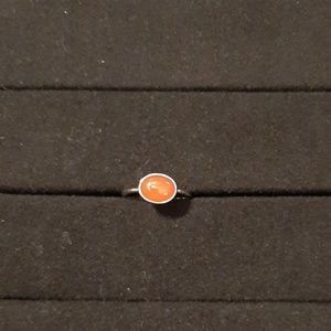 Silver ring with orange amethyst